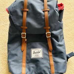 Herschel Supply Company Heritage Backpack in Navy with red stripe lining.